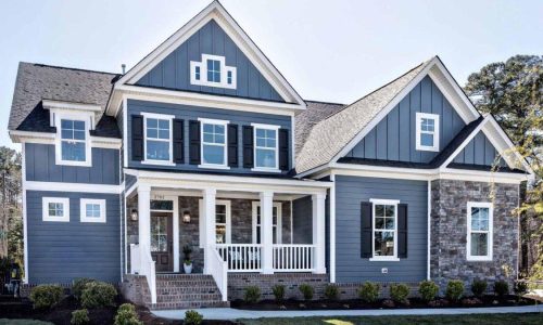 Blue James Hardie fiber cement siding with white trim on a modern two-story home in Connecticut