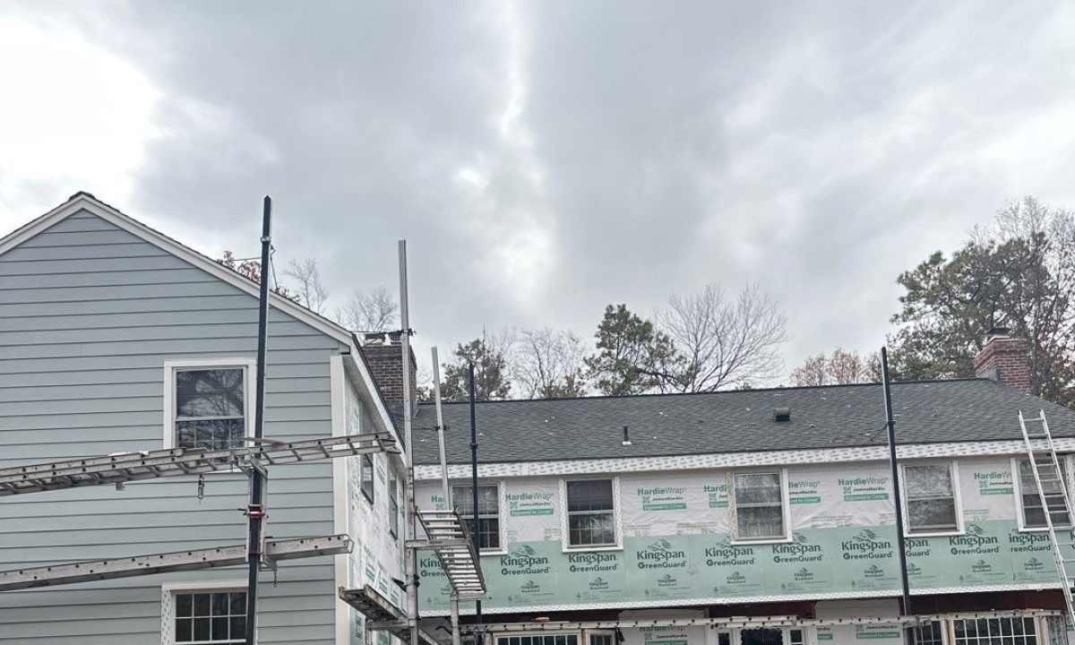 "MJT Siding crew installing new siding on a home in Columbia, Connecticut during full exterior renovation.